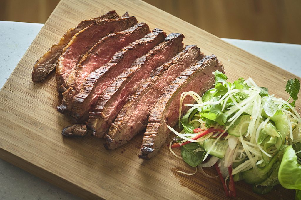 Aaron Carr BBQ skirt steak with green papaya, roasted rice and nahm jim