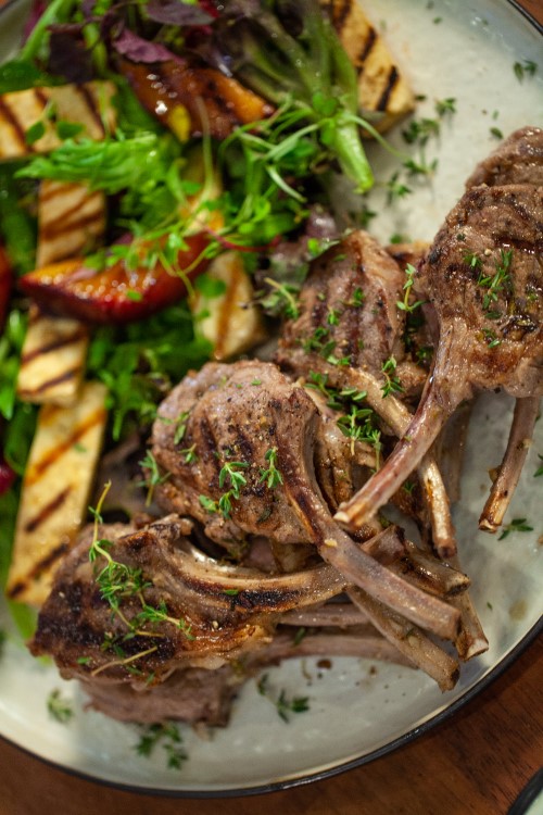 Mediterranean lamb lollipops with peach and halloumi salad